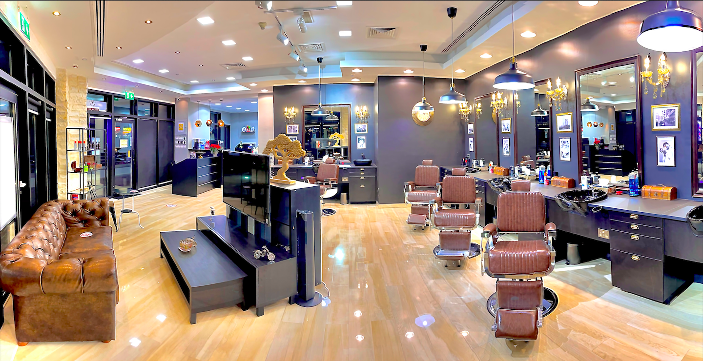 Sharp fade and lined-up hairline at James Pro Barbers