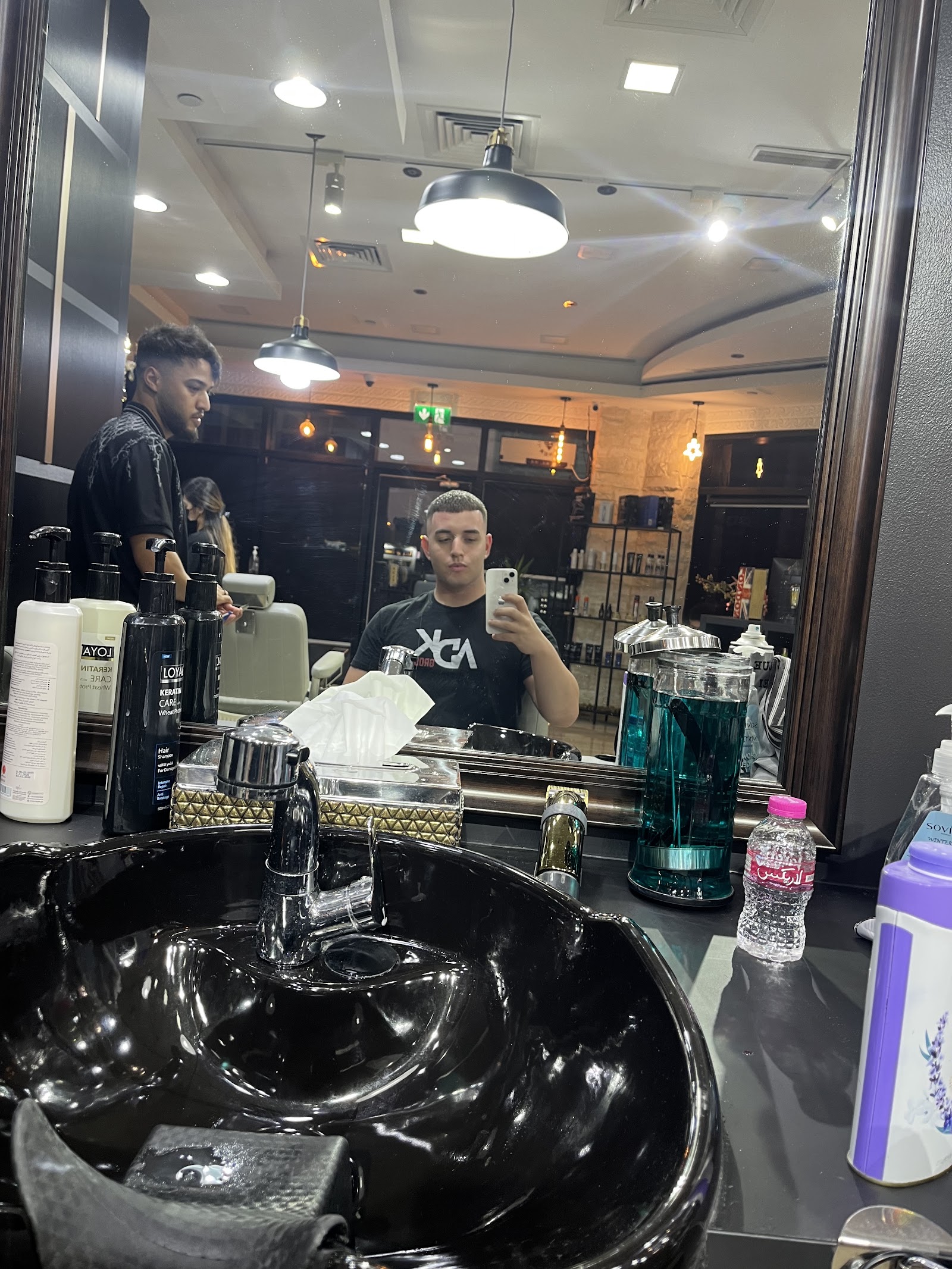 Interior of the James Pro Barbers shop in JLT